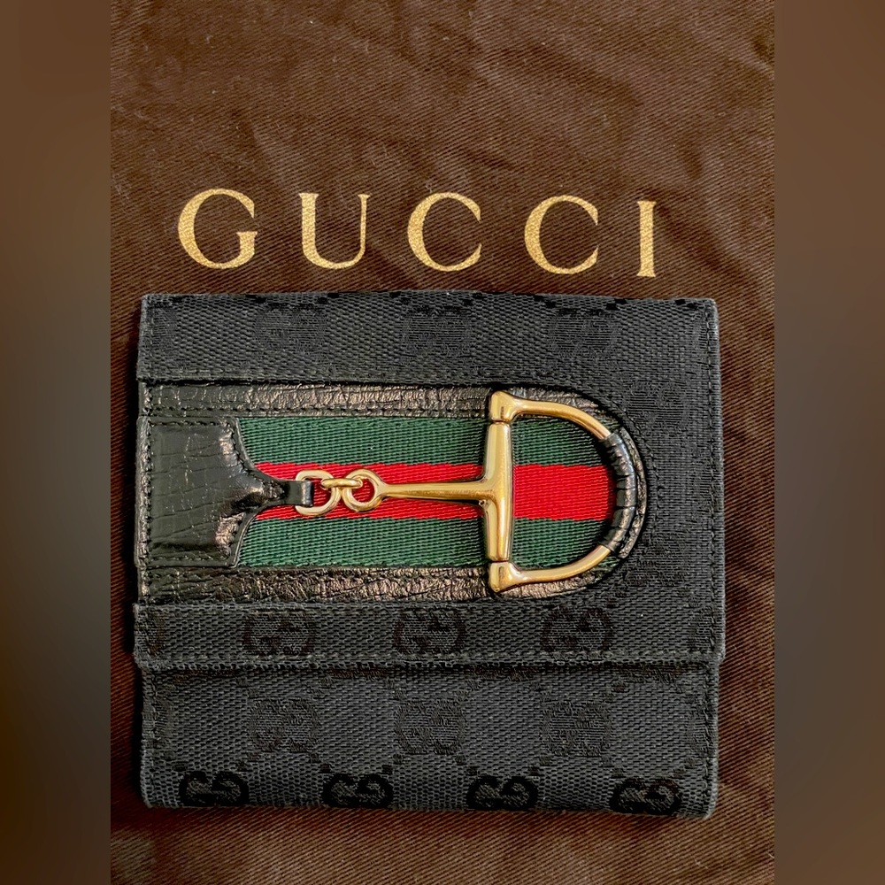 Gucci vtg black Monogram Canvas horsebit wallet in good shape.